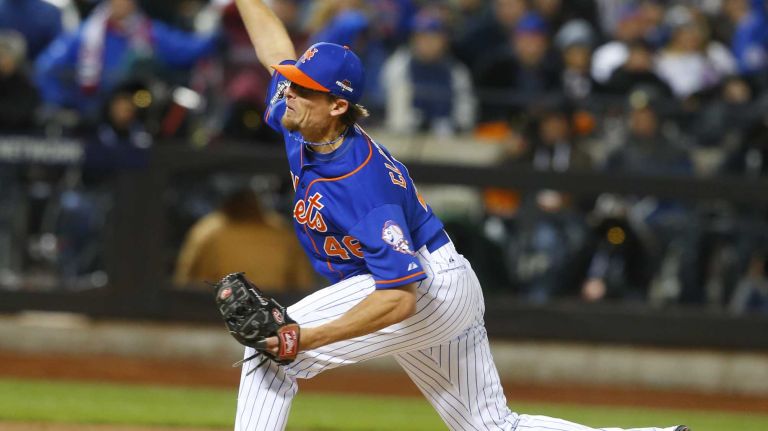 New York Mets relief pitcher Tyler Clippard (46) delivers the pitch in the eighth inning during Game 2 of the NLCS against the Chicago Cubs at Citi Field on Sunday, Oct. 18, 2015.