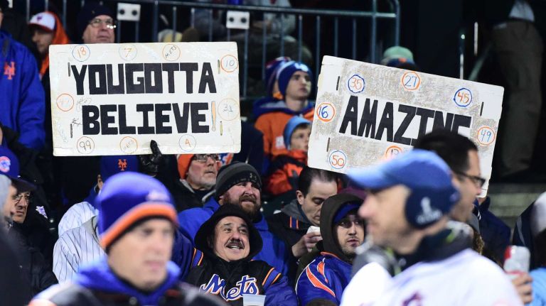 New York Mets fans have the signs out during Game 2 of the NLCS against the Chicago Cubs at Citi Field on Sunday, Oct. 18, 2015.