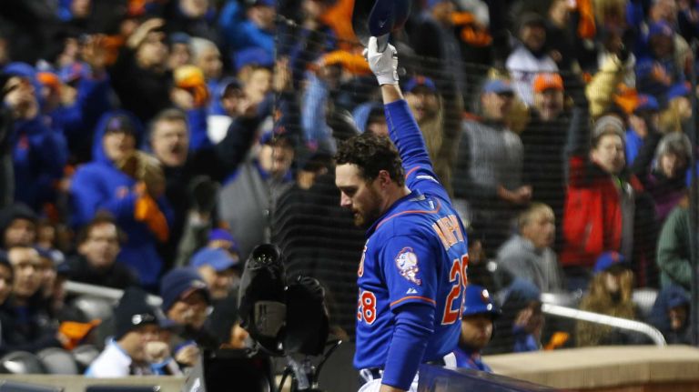 New York Mets second baseman Daniel Murphy (28) gives th curtain call in the first inning on the 2 run homerun during Game 2 of the NLCS against the Chicago Cubs at Citi Field on Sunday, Oct. 18, 2015.