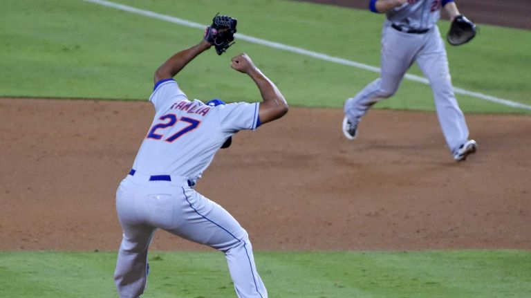 The New York Mets celebrate their National League Division Series victory over the Los Angeles Dodgers at Dodger Stadium in Los Angeles on Oct. 15, 2015.