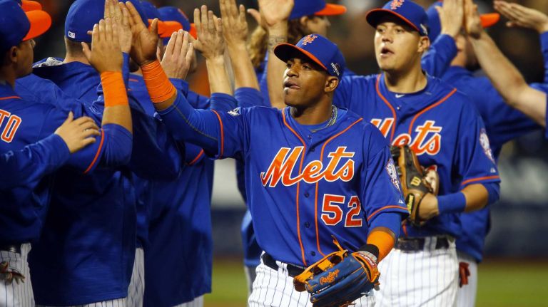 Yoenis Cespedes 11 Yoenis Cespedes #52 of the New York Mets celebrates with his teammates after defeating the Los Angeles Dodgers at Citi Field in the Queens after Game 3 of the NLDS on Monday, Oct. 12, 2015