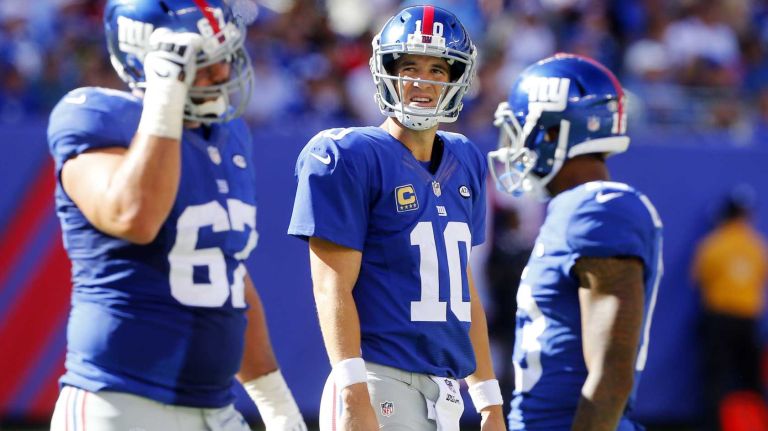 Eli Manning #10 of the New York Giants looks on in the fourth quarter after loss of possession against the Atlanta Falcons during an NFL game at MetLife Stadium on Sunday, Sept. 20, 2015.