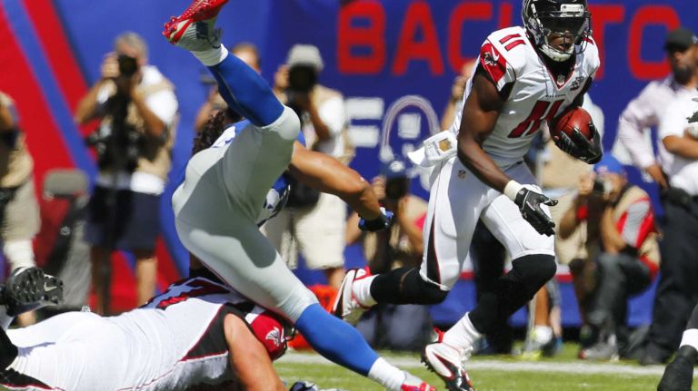 Julio Jones #11 of the Atlanta Falcons runs with the ball after the catch against the New York Giants during an NFL game at MetLife Stadium on Sunday, Sept. 20, 2015.