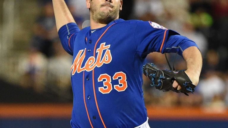 Subway Series: Yankees vs. Mets 62 New York Mets starting pitcher Matt Harvey delivers a pitch against the New York Yankees during the first inning of a baseball game at Citi Field on Sunday, Sept. 20, 2015.