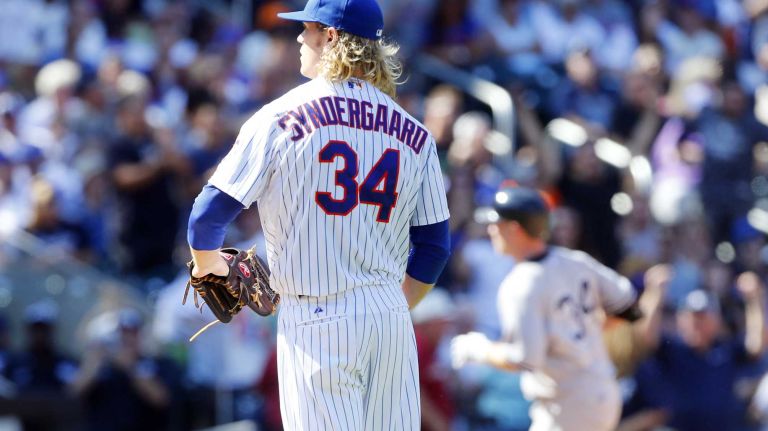 Subway Series: Yankees vs. Mets 64 Noah Syndergaard #34 of the New York Mets looks on after surrendering a sixth inning two run home run against Brian McCann #34 of the New York Yankees at Citi Field on Saturday, Sept. 19, 2015.