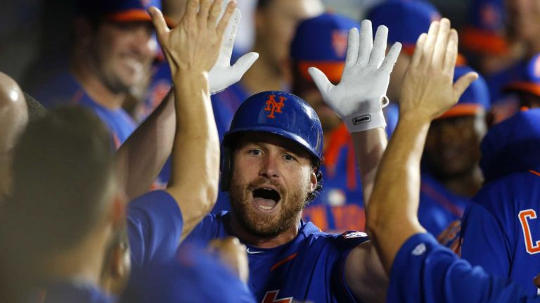 Subway Series: Yankees vs. Mets 76 Daniel Murphy of the New York Mets celebrates his sixth-inning home run against the New York Yankees at Citi Field on Friday, Sept. 18, 2015.