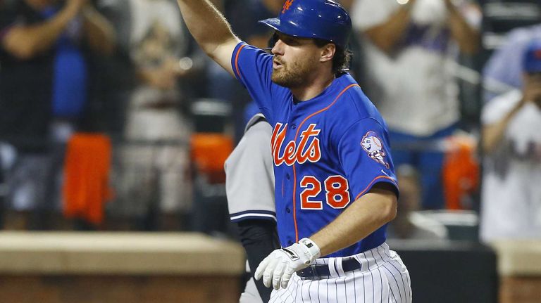 Subway Series: Yankees vs. Mets 79 Daniel Murphy of the New York Mets celebrates his sixth-inning home run against the New York Yankees at Citi Field on Friday, Sept. 18, 2015.