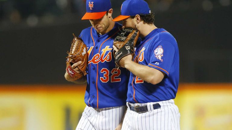 Subway Series: Yankees vs. Mets 90 Daniel Murphy of the New York Mets talks with Steven Matz during the third inning against the New York Yankees at Citi Field on Friday, Sept. 18, 2015.