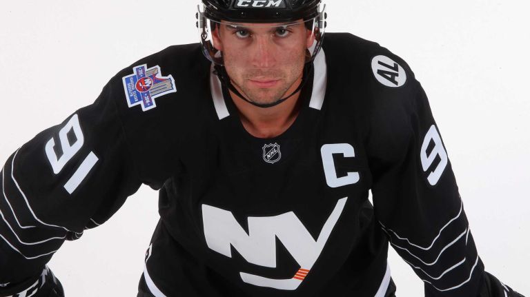 John Tavares #91 of the New York Islanders models the team's third uniform during a photo session on Sept. 15, 2015 at Iceworks in Syosset.