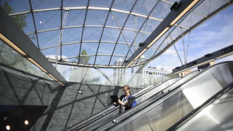 A person enters the 34th Street-Hudson Yards No. 7 station in Manhattan as service begins on Sunday, Sept. 13, 2015.