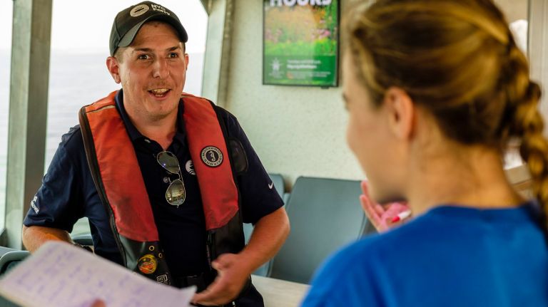 Deckhand Matthew Kleinman describes his NYC Ferry duties to amNY reporter Abigail Weinberg while traversing the South Brooklyn route earlier this month.