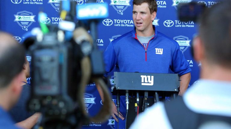 Giants quarterback Eli Manning speaks to the media during training camp at the Quest Diagnostics Training Center in East Rutherford, New Jersey, on Friday, July 31, 2015.