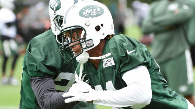 New York Jets cornerback Buster Skrine (41) runs drills against cornerback Marcus Williams (20) at the Jets' Atlantic Health Training Center on Monday, August 10, 2015 in Florham Park, N.J.