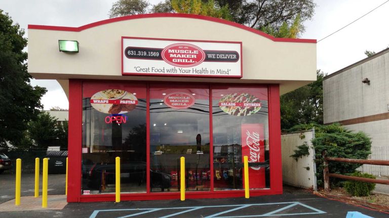 Muscle Maker Grill, pictured in Huntington Station is a franchise eatery focused on lean protein-based eating and healthier, quick alternatives. The chain would fall under the state wage board's minimum wage requirements.