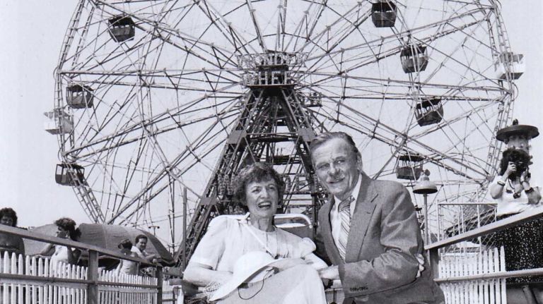 Betty Lind, who suffers from multiple sclerosis, with fiance Bob Olds, in front of the Wonder Wheel in Coney Island in an undated photo, just before they were married on the ride. They are the first couple married on the Wonder Wheel.
