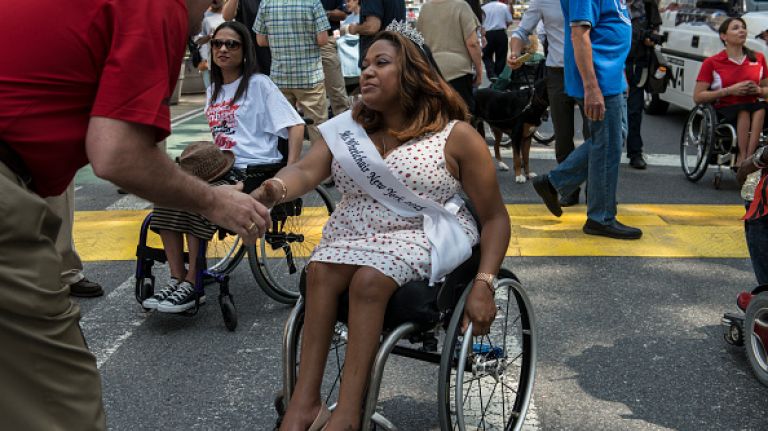 Scenes from the first annual Disability Pride parade in NYC 22 Miss Wheelchair New York greets a supporter at the first annual Disability Pride Parade on July 12, 2015 in New York City. The parade calls attention to the rights of people with disabilities and coincides with the 25th anniversary of the Americans with Disabilities Act.