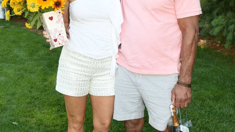 Julie Lamb and Mark Henken at the Last Chance Animal Rescue benefit hosted by Ruth Katz on July 11, 2015, in Bridgehampton.