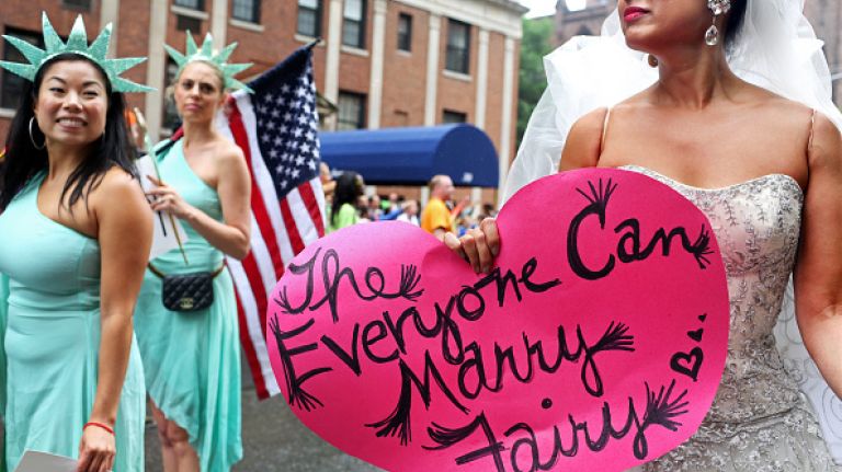 A participant wearing a wedding dress marches in the Gay Pride Parade on June 28, 2015 in New York City. 