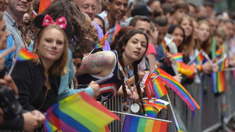 Spectators await the start of the 2015 New York City Pride March on Sunday, June 28, 2015, in Manhattan. The parade starts uptown and ends near the Stone Wall Inn in Greenwich Village.