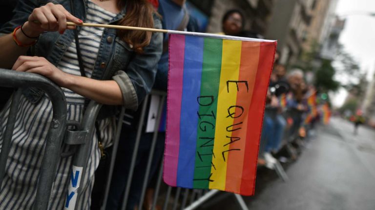 Spectators await the start of the 2015 New York City Pride March on Sunday, June 28, 2015, in Manhattan. The parade starts uptown and ends near the Stone Wall Inn in Greenwich Village.
