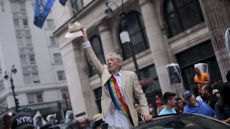 New York City Pride March grand marshal Sir Ian McKellen waves to the crowd at the start of the 2015 parade on Sunday, June 28, 2015, in Manhattan.