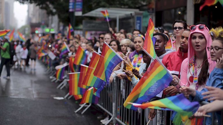 Spectators await the start of the 2015 New York City Pride March on Sunday, June 28, 2015, in Manhattan. The parade starts uptown and ends near the Stone Wall Inn in Greenwich Village.