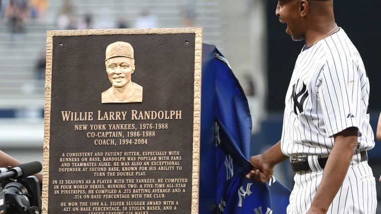 Former New York Yankee Willie Randolph reacts as he unveils his Monument Park plaque during the 69th Old-Timers' Day at Yankee Stadium before a baseball game between the Yankees and the Detroit Tigers on Saturday, June 20, 2015.