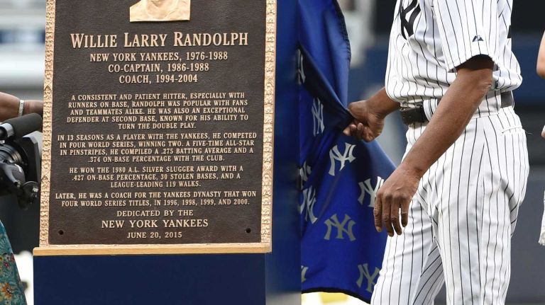 Former New York Yankee Willie Randolph reacts as he unveils his Monument Park plaque during the 69th Old-Timers' Day at Yankee Stadium before a baseball game between the Yankees and the Detroit Tigers on Saturday, June 20, 2015.