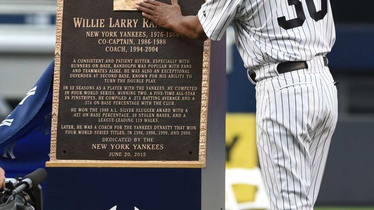 Former New York Yankees Willie Randolph admires his Monument Park plaque during the 69th Old-Timers' Day at Yankee Stadium before a baseball game between the Yankees and the Detroit Tigers on Saturday, June 20, 2015.