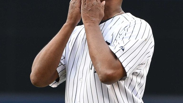 Former New York Yankee Willie Randolph blows a kiss to fans during his Monument Park plaque dedication at the 69th Old-Timers' Day at Yankee Stadium before a baseball game between the Yankees and the Detroit Tigers on Saturday, June 20, 2015.
