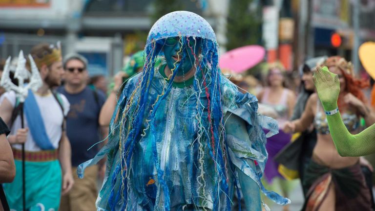 2015 Coney Island Mermaid Parade photos 39 A marcher in the Coney Island Mermaid Parade heads down Surf Avenue on Saturday, June 20, 2015.