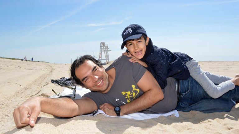 Nader Paksima and his son, Kamran, hang out at Main Beach in East Hampton on Sunday, June 7, 2015.