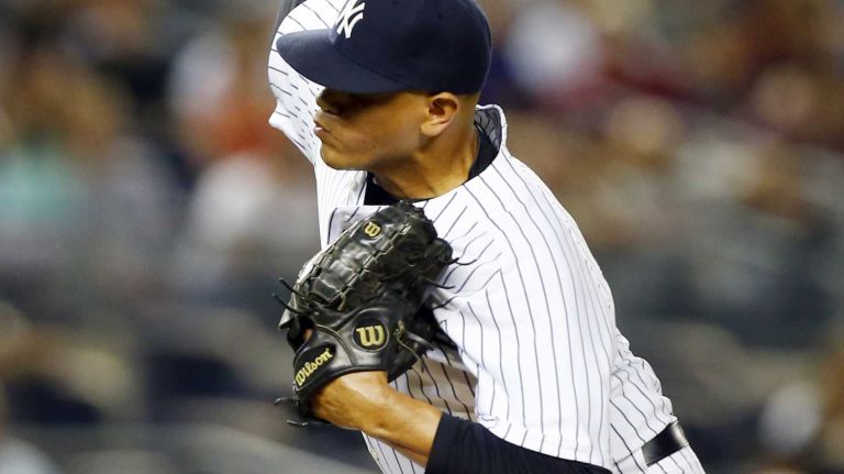 Dellin Betances of the Yankees pitches in the seventh inning against the Toronto Blue Jays at Yankee Stadium on Tuesday, June 17, 2014.