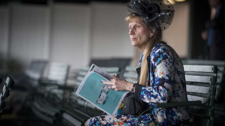 April Bodinizzo of Holden, Mass., before the race time where Triple Crown challenger American Pharoah sought to make history at Belmont Park Race Track in Elmont June 6, 2015.