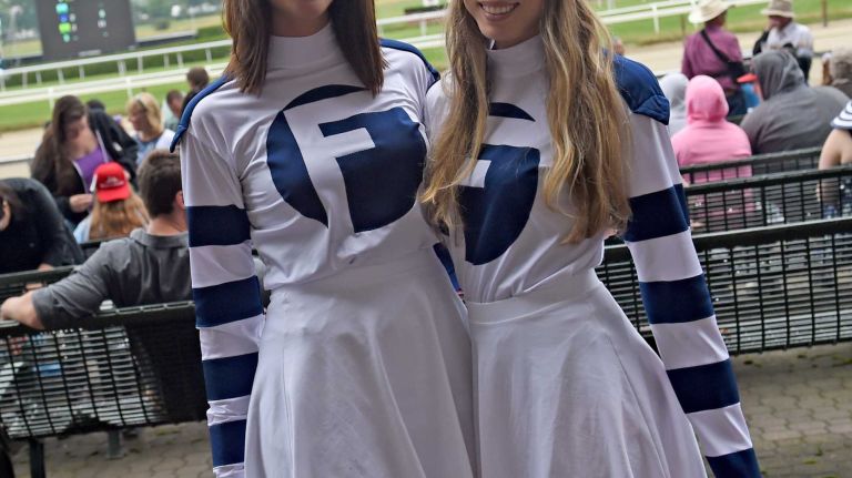 Kristen Lucente of Massapequa and Brittany Derasmo of Bethpage dressed for the occasion at Belmont Park on the morning of the Belmont Stakes. They were there representing the Final Furlong Racing Stable on Saturday, June 6, 2015.