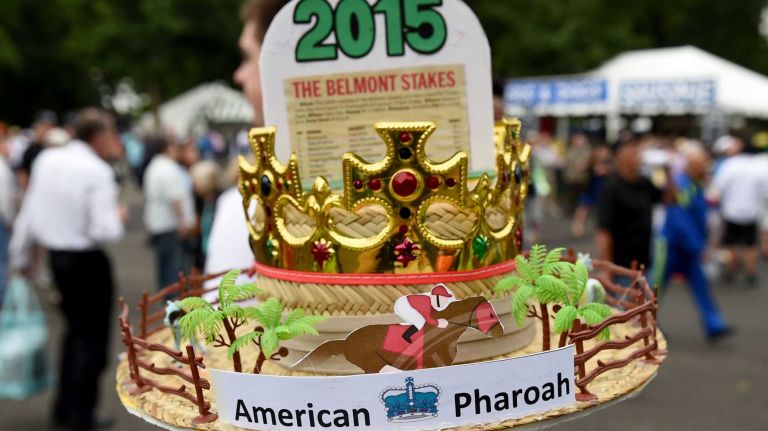 Edwin Callazo is dressed for the occasion with his America Pharoah hat at Belmont Park on the morning of the Belmont Stakes, on Saturday, June 6, 2015.