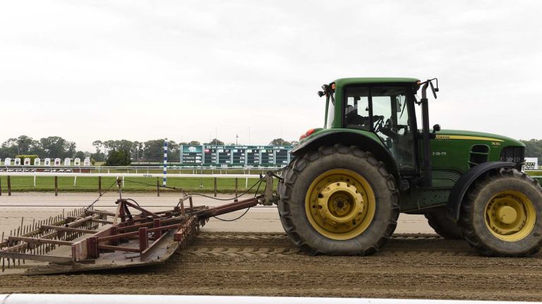 A tractor grooms the track on Saturday morning before the 147th running of the Belmont Stakes on June 6, 2015, in Elmont.
