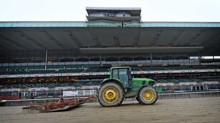 Tractors prepare the track at Belmont Park in Elmont on June 1, 2015.