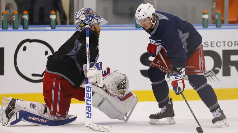 Goalie Henrik Lundqvist and J.T. Miller of the Rangers look on during practice on Thursday, May 28, 2015 at the MSG Training Center in Greenburgh, N.Y.