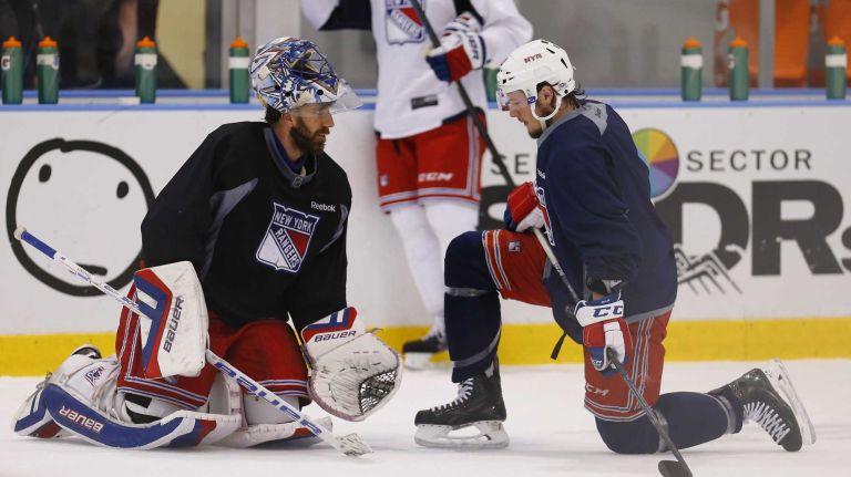 Goalie Henrik Lundqvist and J.T. Miller of the Rangers look on during practice on Thursday, May 28, 2015 at the MSG Training Center in Greenburgh, N.Y.