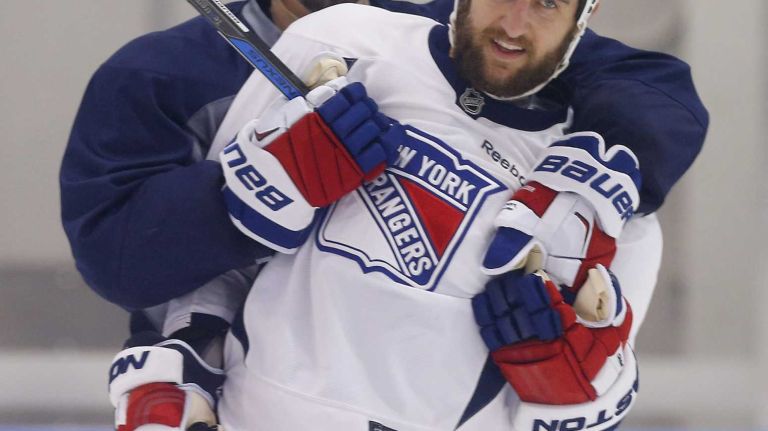 Chris Kreider and Tanner Glass of the Rangers smile on Thursday, May 28, 2015 at the MSG Training Center in Greenburgh, N.Y.