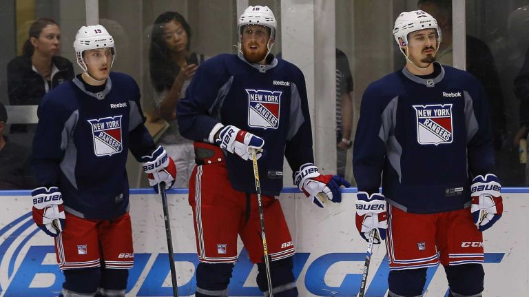 Jesper Fast, Marc Staal and Chris Kreider of the Rangers look on during practice on Thursday, May 28, 2015 at the MSG Training Center in Greenburgh, N.Y.