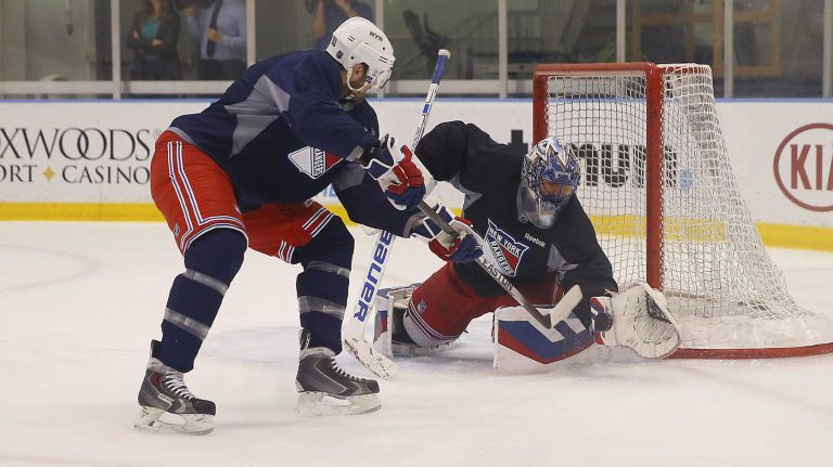 Rick Nash of the Rangers and Henrik Lundqvist run drills during practice on Thursday, May 28, 2015 at the MSG Training Center in Greenburgh, N.Y.