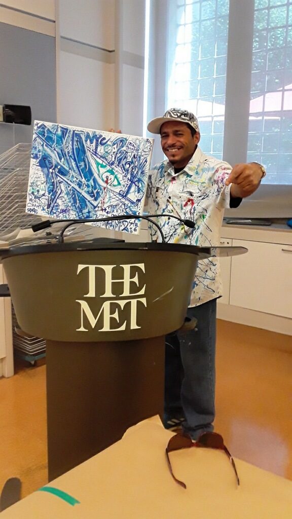 Still finding beauty: Legally-blind Bronx muralist takes art campaign to UN & Met 2