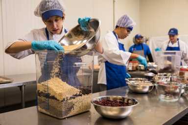 Granologists working to create Luv Michael’s granola Courtesy Luv MIchael