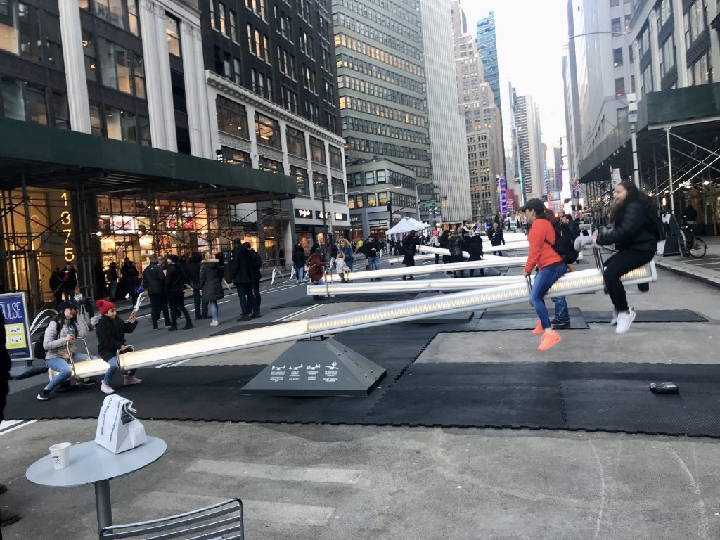 people-in-garment-district-on-seesaw.jpg