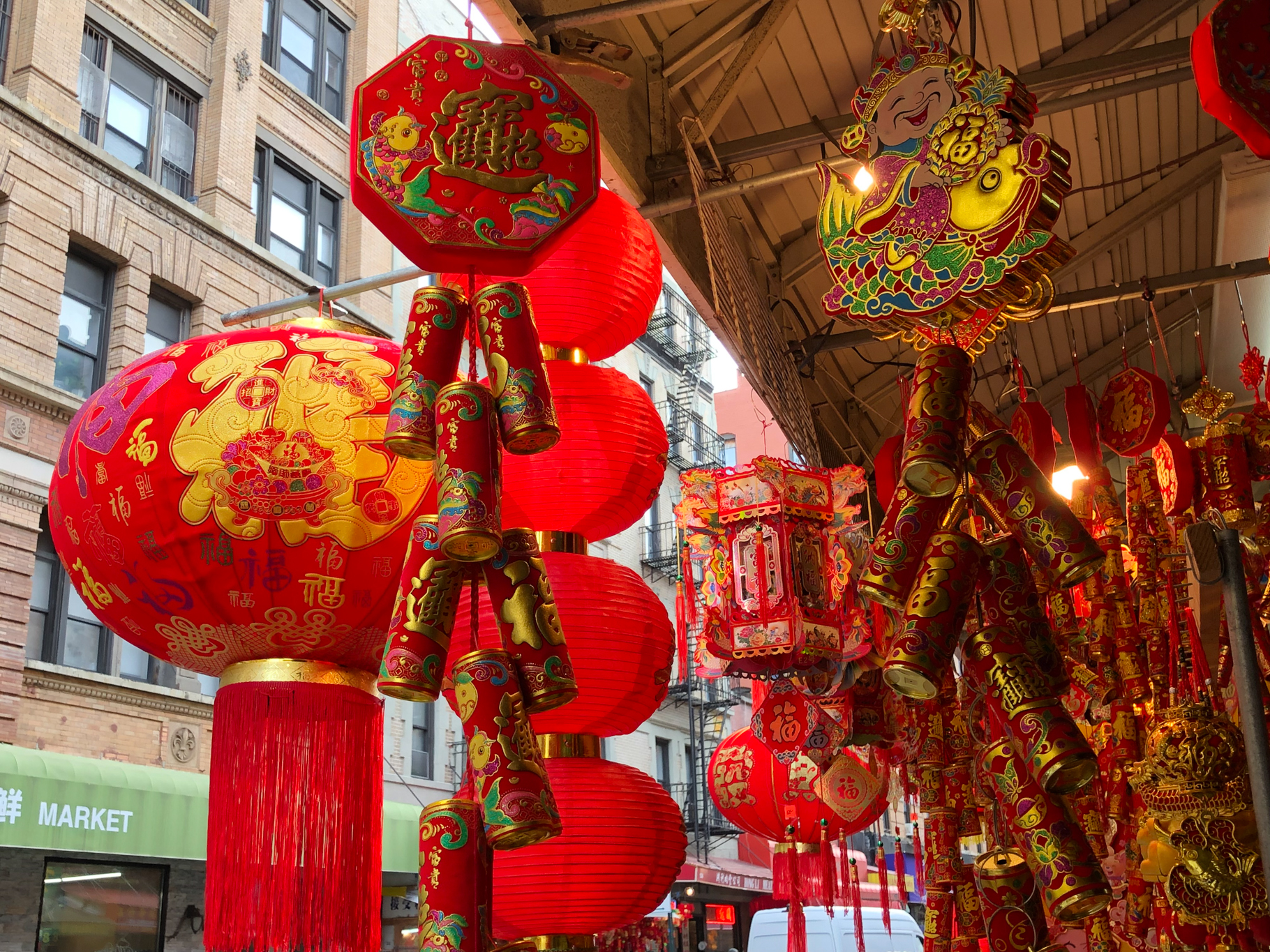 Red lanterns swaying in the wind tell that New Years is coming.