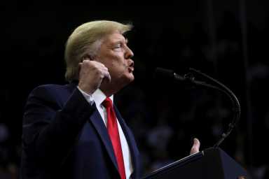 FILE PHOTO: U.S. President Donald Trump holds a campaign rally at Drake University in Des Moines