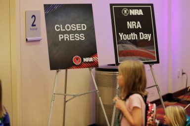 Children arrive for NRA Youth Day during the National Rifle Association (NRA) annual meeting in Indianapolis, Indiana