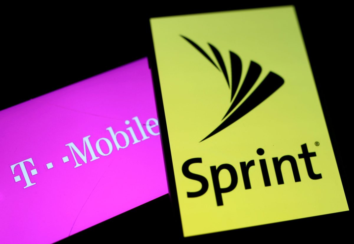 Smartphones with the logos of T-Mobile and Sprint are seen in this illustration
